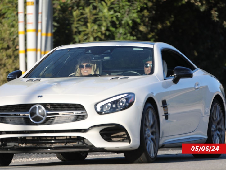 britney and paul driving together